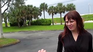 Hot redhead MILF accepts a hot young..